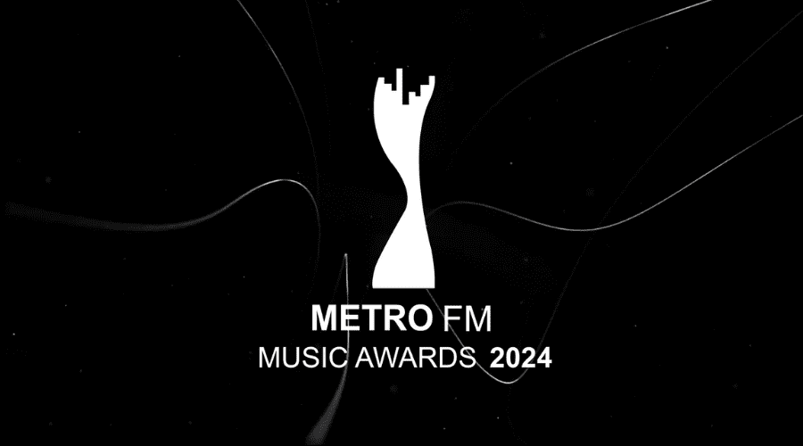 Black background with a white, abstract award trophy in the centre resembling a hand holding a city skyline. Below the trophy, bold text reads 