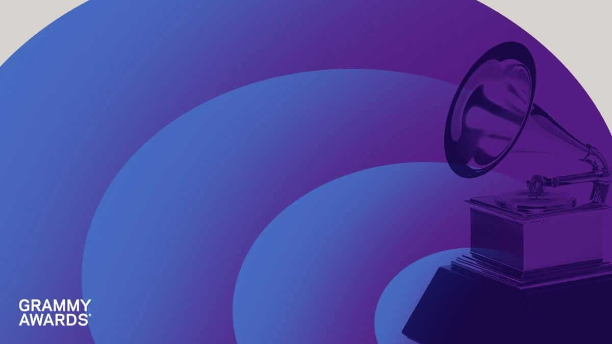 A stylised image features a gramophone trophy, symbolising the Grammy Awards, on the right. The background has overlapping blue and purple arcs. The words 