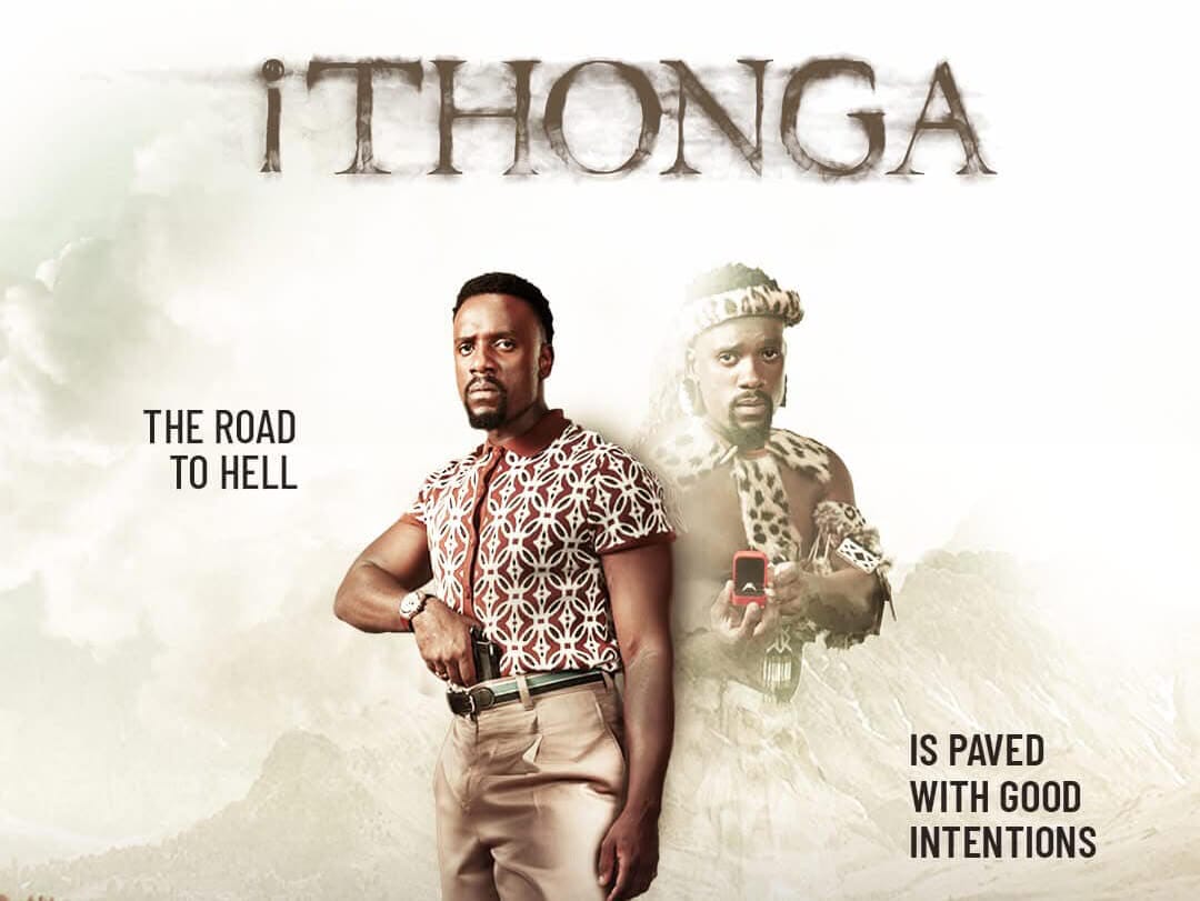 A man in modern clothes stands confidently holding a gun, with a faded image of him in traditional Zulu attire behind. Above is the title “iThonga,” set against misty mountains. Text reads: “THE ROAD TO HELL IS PAVED WITH GOOD INTENTIONS.” Downtown Africa sync music vibes.